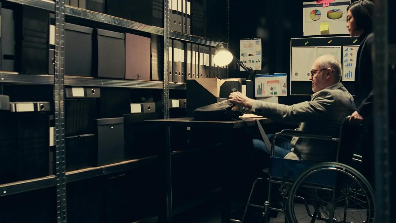 A detective with an impairment assembles case timelines using archival records.